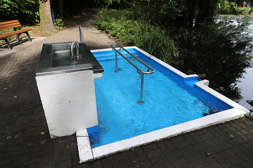 a Kneipp pool in the forest