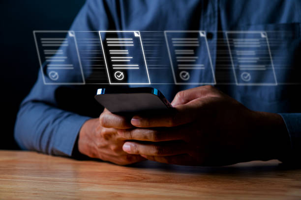 istock A businessman embraces the paperless workplace concept, efficient document management while checking a digital document in a virtual environment. 1688713197
