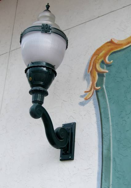 White glass lantern attached to wall. Leavenworth, Washington State, USA