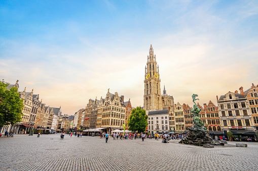Antwerp, Belgium - June 29, 2023: General view of the Grote Markt, the main town square of the old historic and touristic city of Antwerp, Belgium.  In the background are the famous Cathedral of the Virgin Mary, Brabo's monument and historic houses.