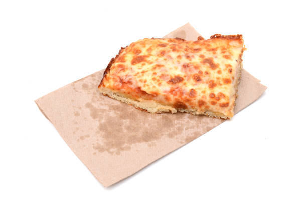 Slice of fresh cheese pizza with napkin paper