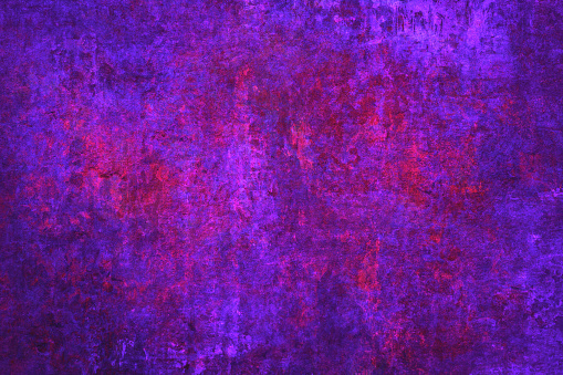 A textured purple grunge background combines the richness of the color purple with a distressed and textured appearance, creating a visually captivating and artistic backdrop.