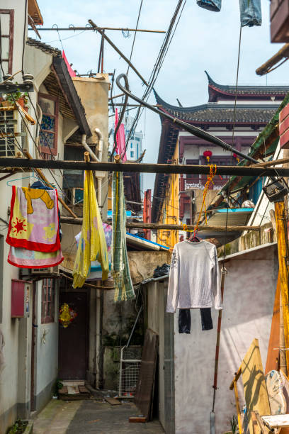 Little alley in the old town of Shanghai Little alley in the old town of Shanghai, China. chinese slum stock pictures, royalty-free photos & images