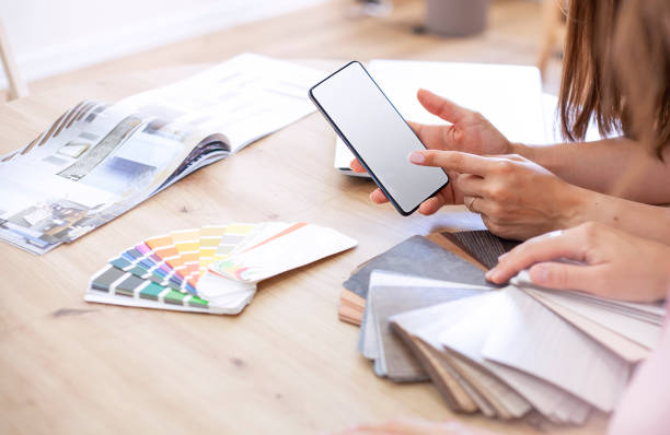 istock woman's hands holding a smartphone close-up. 1688837924