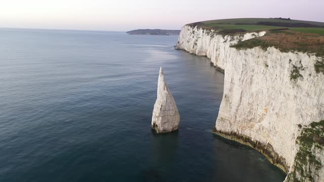 Aerial video of The Chalk Cliffs of Old Harry Rocks on the South Coast of England