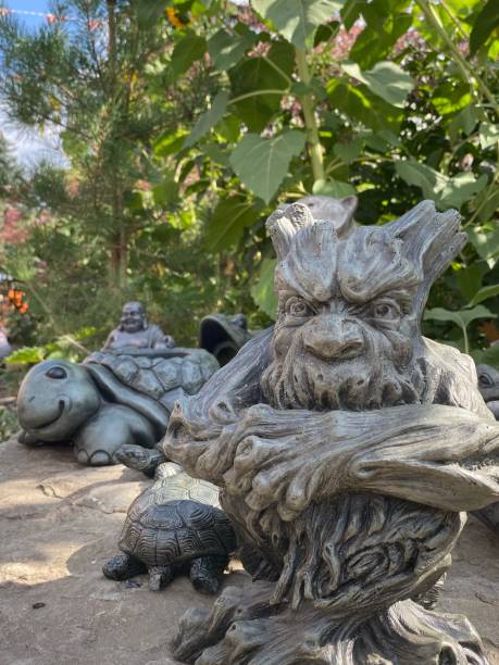 istock Garden gnomes and tortoise statues 1688843613