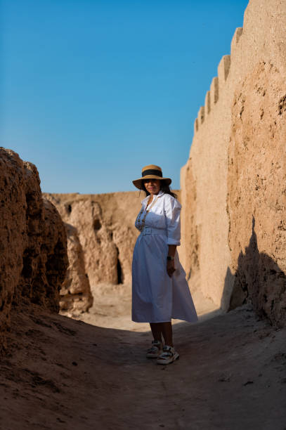 istock Lady exploring the Khorezm fortress, Uzbekistan 1688859182