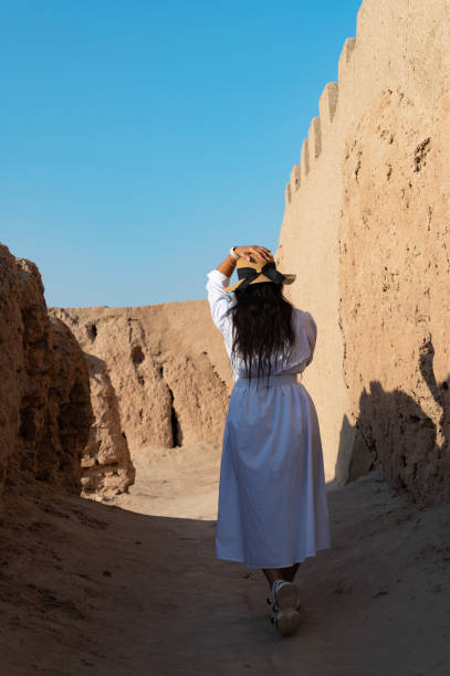 istock Lady exploring the Khorezm fortress, Uzbekistan 1688859751