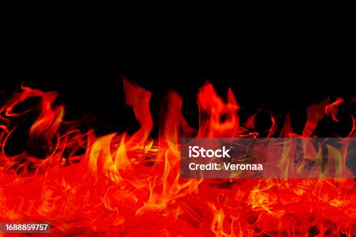 istock Fire flames on black background. 1688859757