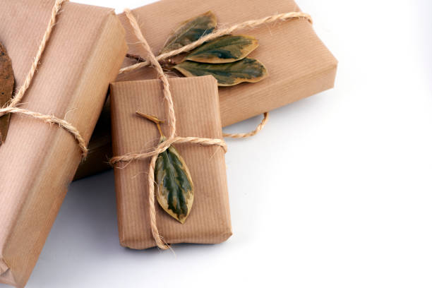 istock Christmas gift packages wrapped in craft paper. 1688875745