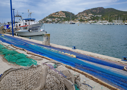 Port d'Andratx, Spain - 7 May, 2023: Fishing boats in the Port d'Andratx, Mallorca