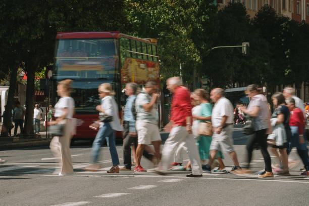 istock People in motion crossing a street 1688906956