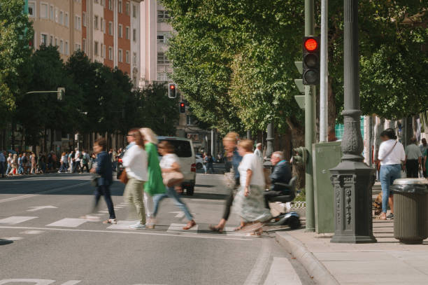 istock People in motion crossing a street 1688906983