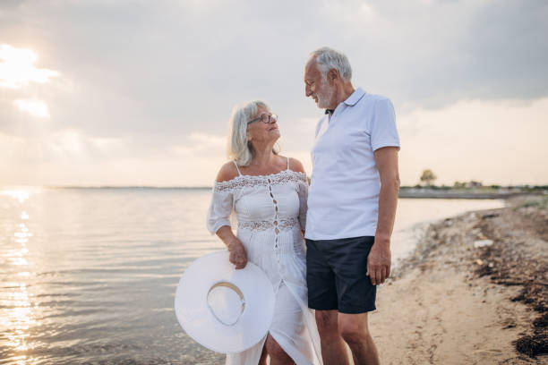 istock Senior couple by the sea 1688907518