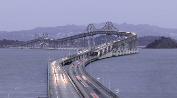 Dusk over the Richmond-San Rafael Bridge in Marin County, California, USA. Dusk over the Richmond-San Rafael Bridge in Marin County, California, USA. san rafael california stock pictures, royalty-free photos & images