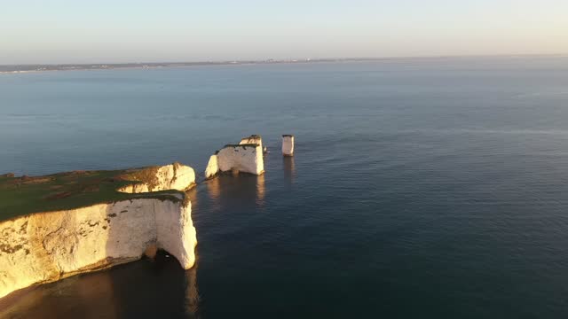 Aerial video of The Chalk Cliffs of Old Harry Rocks on the South Coast of England