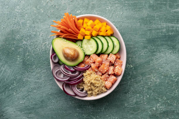istock poke bowl salmon with quinoa and vegetables 1688913743