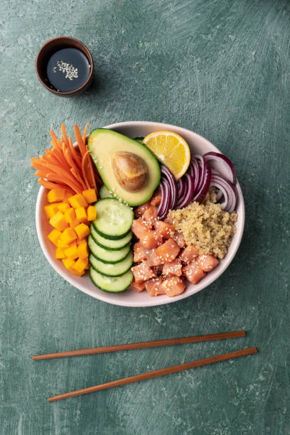 istock poke bowl salmon with quinoa and vegetables 1688914249