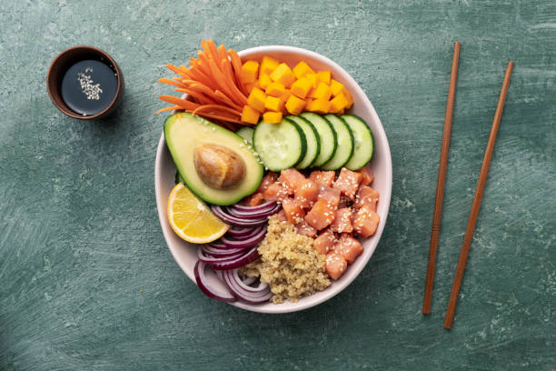 istock poke bowl salmon with quinoa and vegetables 1688914262