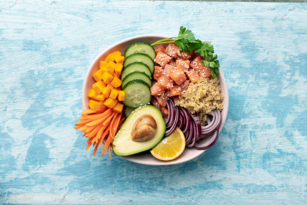 istock poke bowl salmon with quinoa and vegetables 1688914283