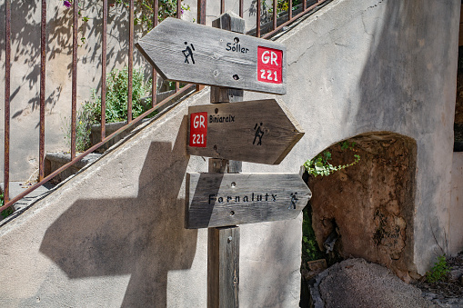 Port de Soller - 12 June, 2023: Signpost on the GR221 hiking trail in the Tramuntana mountains, Mallorca