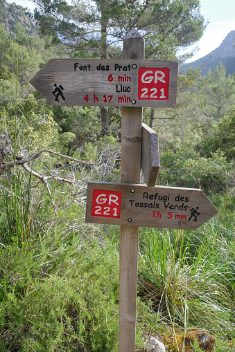 Mallorca, Spain - 12 June, 2023: Signposts for hikers on the GR221 trail, Tramontana Mountains, Mallorca