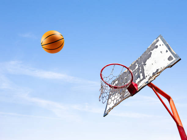 istock Sky-High Basketball Challenge on a Clear Blue Day 1688929566