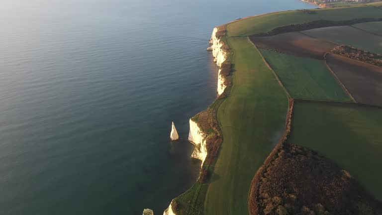 Aerial video of The Chalk Cliffs of Old Harry Rocks on the South Coast of England