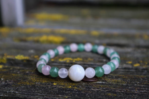 istock Crystal bracelet from aventurine, rose quartz, moonstone. 1688955666