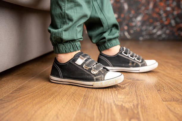 istock casual comfortable children's clothing. pants and sneakers 1688978687