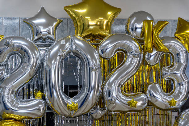 istock 2023 inflatable numerals in gold and silver 1688980355