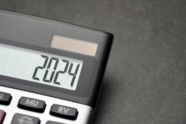istock 2024 on calculator screen. New year 2024 on the calculator display with copy space 1688988125