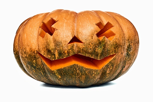 Photo of a men with a pumpkin on the head, ready for the Halloween.