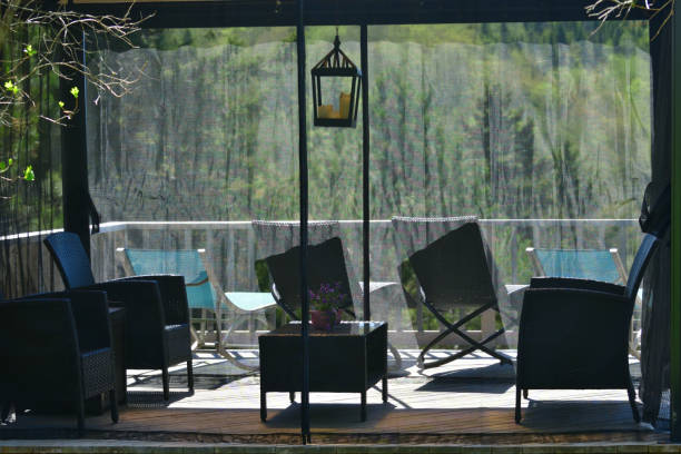 istock Summer Day View Through the Gazebo Screen 1689037325