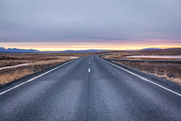 istock asphalt road, iceland 1689051517
