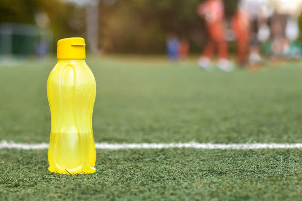 istock Water Bottle on Soccer Field Grass. 1689065465