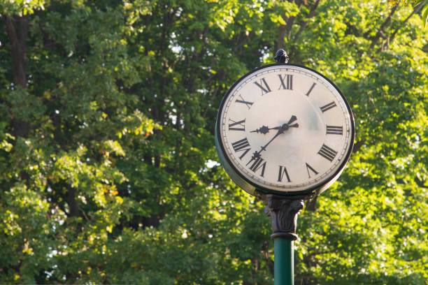 istock An old clock on a city street. 1689078476
