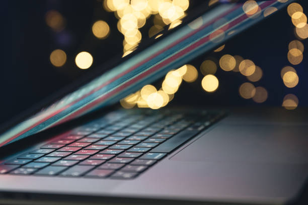 istock Close-up, laptop on a dark background with bokeh. 1689088187