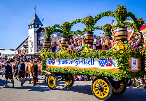 Munich, Germany - September 16: Typical horse-drawn carriage as the innkeepers move in for the opening of the Oktoberfest in Munich on September 16, 2023