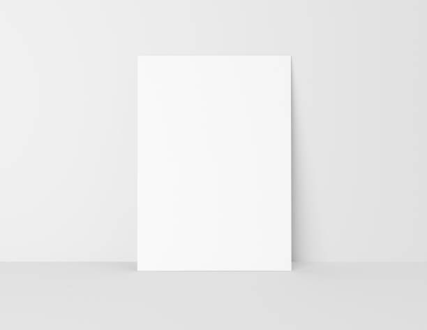 Empty vertical 5x7 ratio poster on gray background Empty vertical 5x7 ratio poster on gray background newsletter mockup stock pictures, royalty-free photos & images