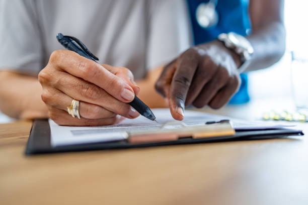 istock African american nurse explaining sickness treatment to elderly patient 1689091082