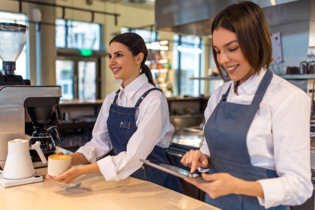 istock Coffee shop assistants feeling good at their working place 1689100129