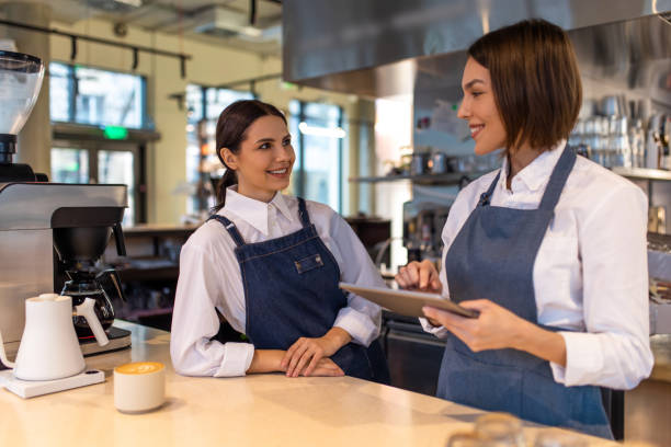 istock Coffee shop assistants feeling good at their working place 1689100143