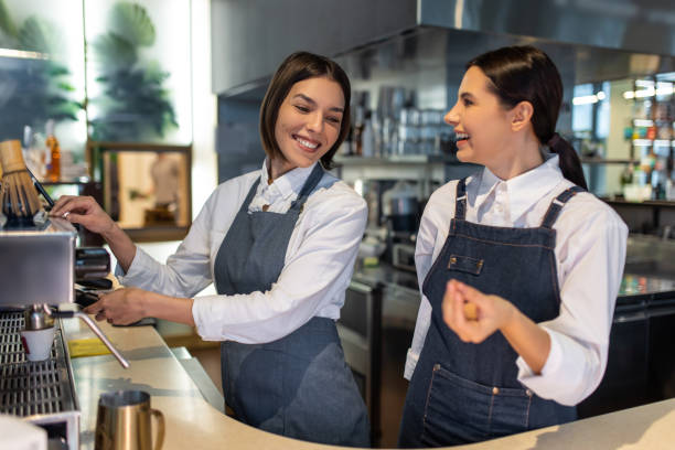 istock Two young smiling shop assistants working and feeling confident 1689100563