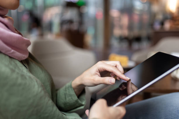 istock Close up picture of a woman using tablet 1689101858