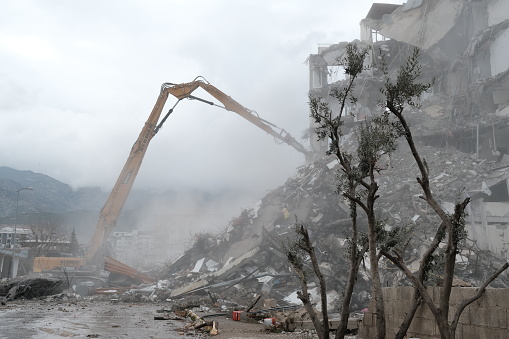 The photo was taken in Hatay province on 03/10/2023 after the earthquake. Buildings damaged in the earthquake were demolished with construction equipment