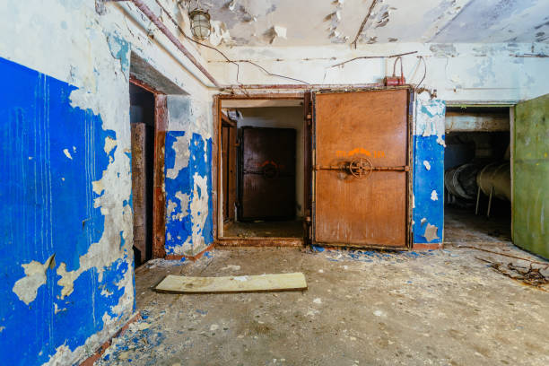 istock Bomb shelter protective construction of civil defense. Large armored blast proof doors with valve 1689107917