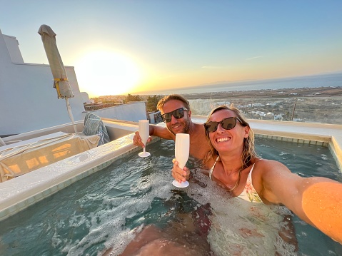 Private pool overlooking the ocean, Santorini Island, Greece.
Romantic vacation gateway concept