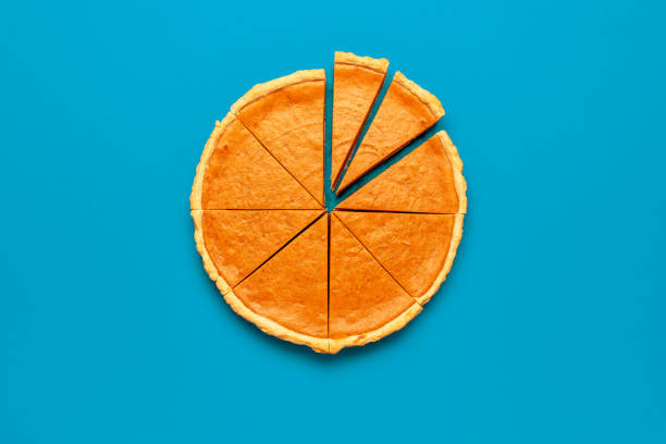 istock Homemade pumpkin pie minimalist on a blue table 1689119929