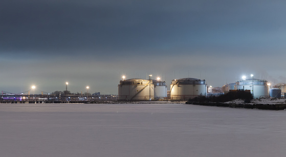 Oil terminal of Saint-Petersburg port, panoramic photo taken on a winter night